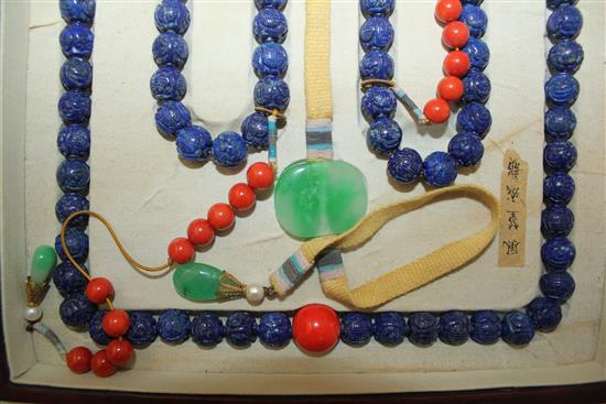 A Chinese lapis lazuli, jadeite and coral necklace, 31.5cm
